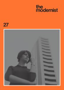 cover of the modernist magazine, black and white photo of woman in front of a high-rise building